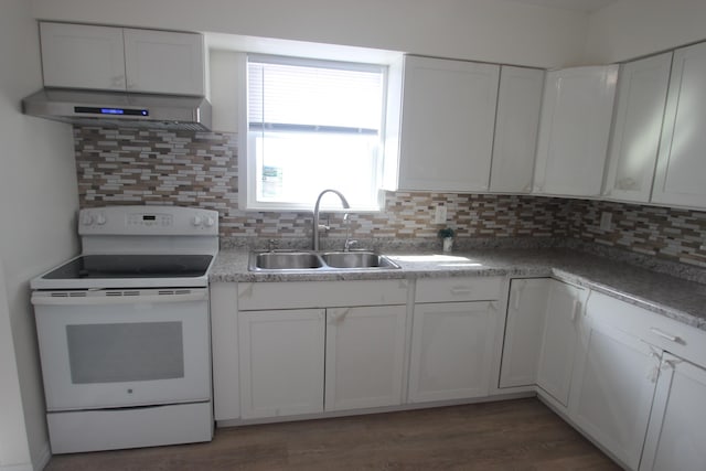 kitchen featuring electric range, white cabinets, a sink, extractor fan, and backsplash