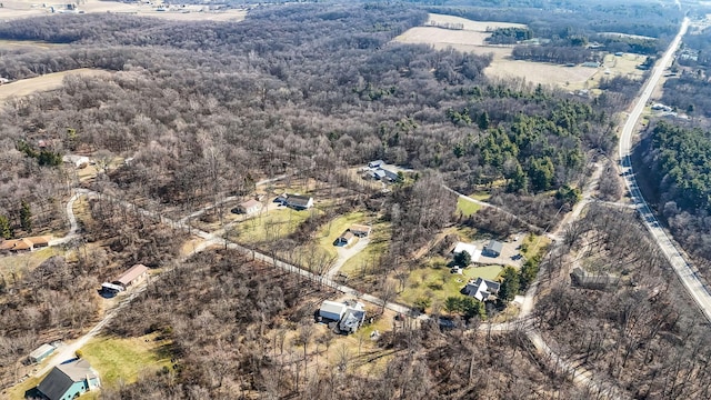 aerial view with a wooded view