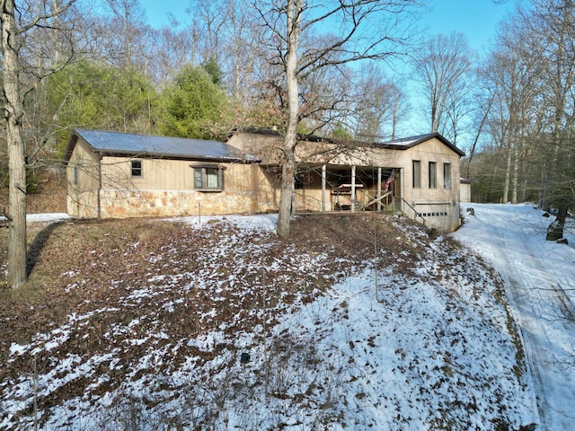 view of front of house with stone siding