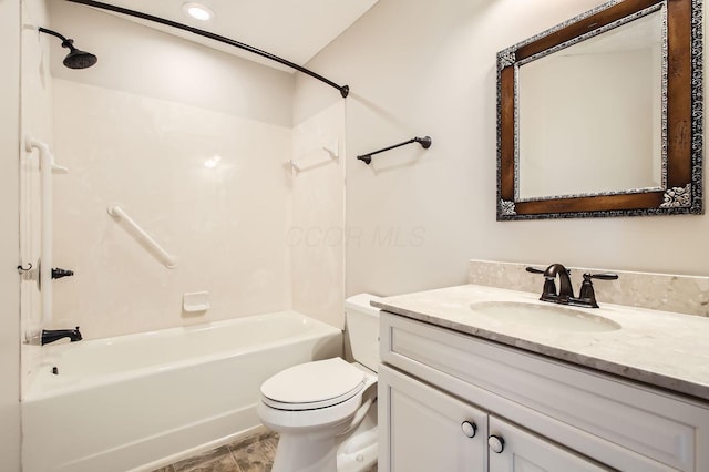 bathroom featuring  shower combination, vanity, and toilet