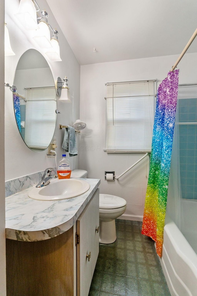 bathroom with toilet, shower / bath combo with shower curtain, and vanity