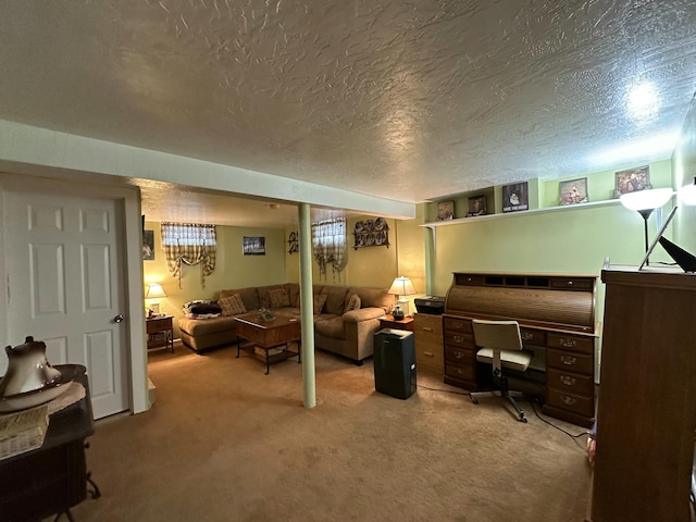 bedroom featuring light carpet and a textured ceiling