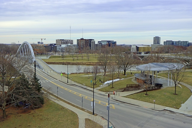 view of street with a city view and a water view