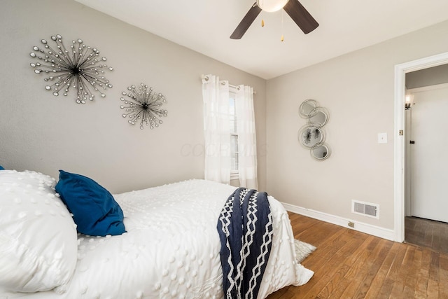 1724 E Livingston Ave, Columbus, OH 43205 - bedroom with hardwood / wood-style flooring, baseboards, and ceiling fan