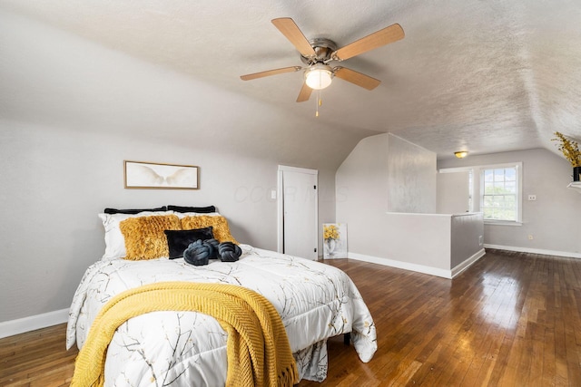 1724 E Livingston Ave, Columbus, OH 43205 - bedroom with lofted ceiling, baseboards, hardwood / wood-style flooring, ceiling fan, and a textured ceiling