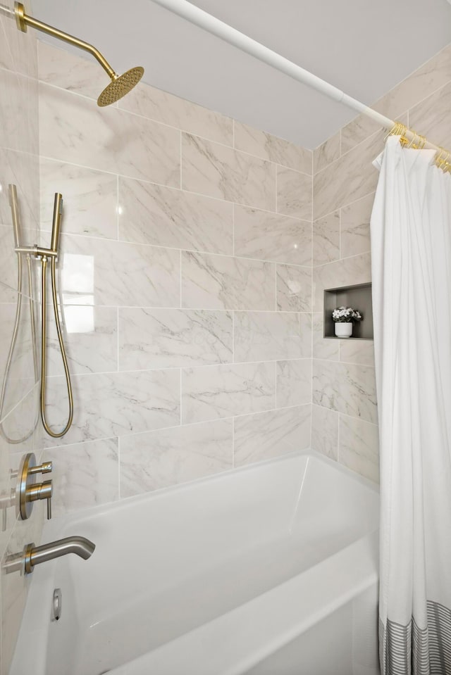 bathroom featuring shower / bath combo with shower curtain