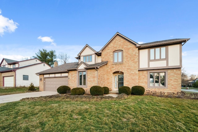 view of front of house featuring a garage, a front yard, concrete driveway, and brick siding