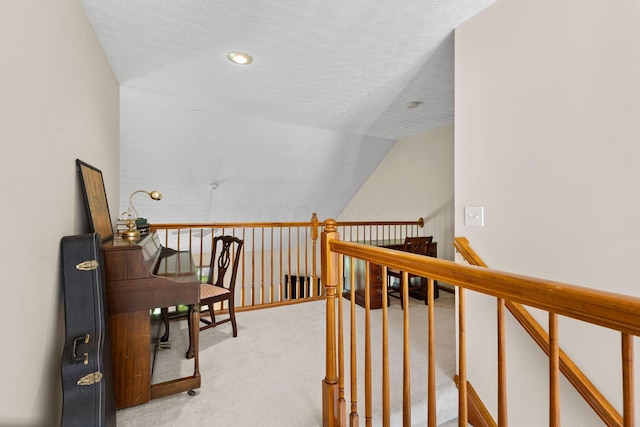 6266 Misty Cove Ln, Columbus, OH 43231 - hallway with light colored carpet, an upstairs landing, and a textured ceiling