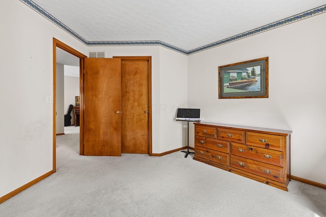 6266 Misty Cove Ln, Columbus, OH 43231 - bedroom featuring light colored carpet, baseboards, and a textured ceiling