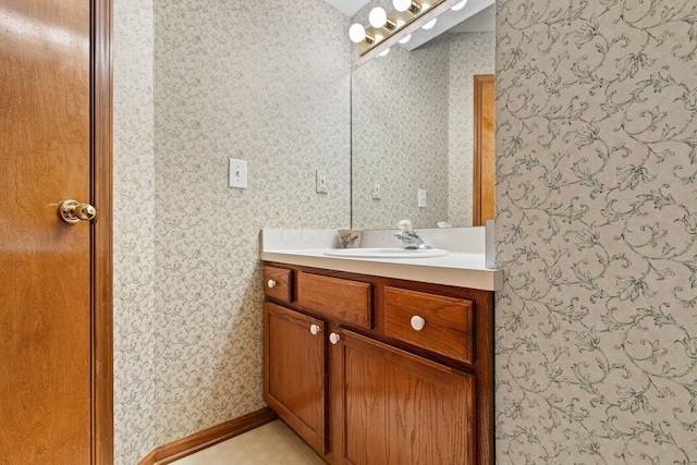 6266 Misty Cove Ln, Columbus, OH 43231 - bathroom featuring wallpapered walls and vanity