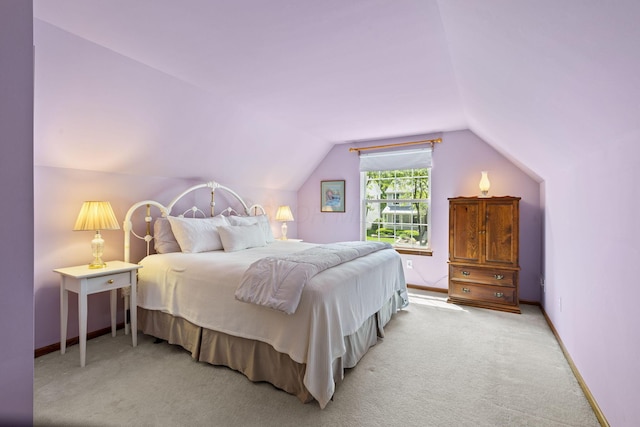 6266 Misty Cove Ln, Columbus, OH 43231 - bedroom with carpet, lofted ceiling, and baseboards
