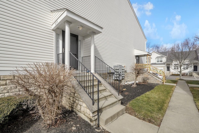 view of side of property with a residential view