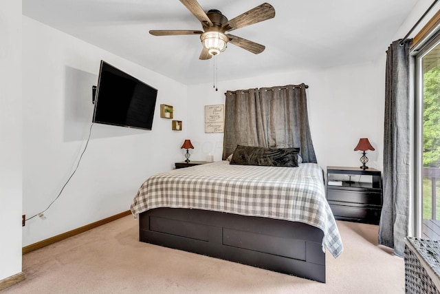 bedroom with baseboards, carpet floors, and ceiling fan