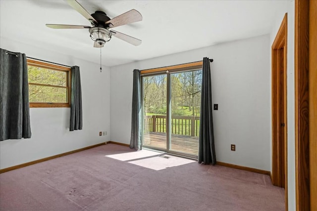 14580 Monroe Mills Rd, Mount Vernon, OH 43050 - carpeted spare room featuring baseboards, a ceiling fan, and visible vents