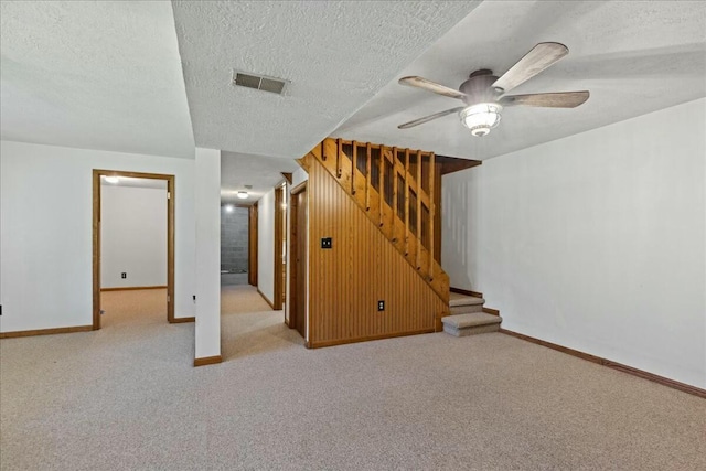 14580 Monroe Mills Rd, Mount Vernon, OH 43050 - finished basement featuring visible vents, carpet flooring, baseboards, and ceiling fan