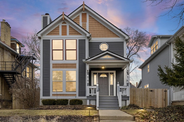 view of front of house with fence