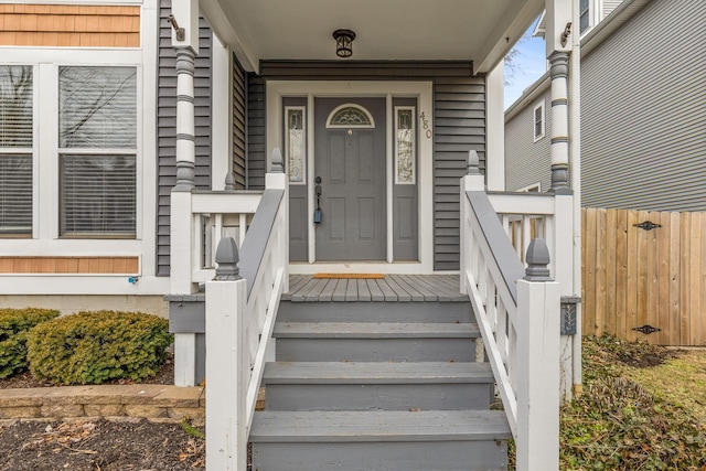 property entrance with fence