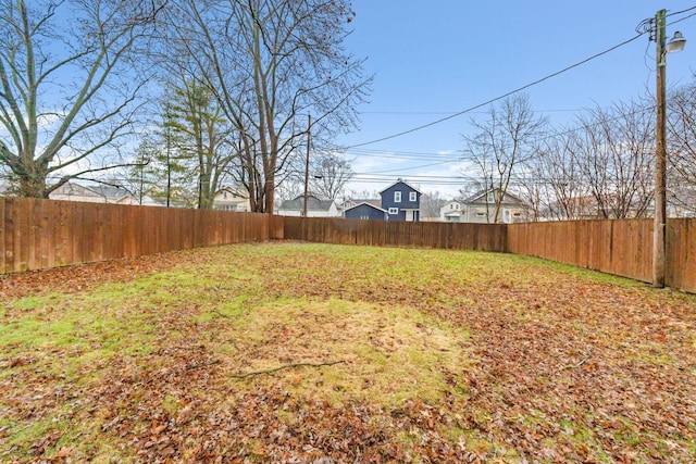 view of yard featuring a fenced backyard