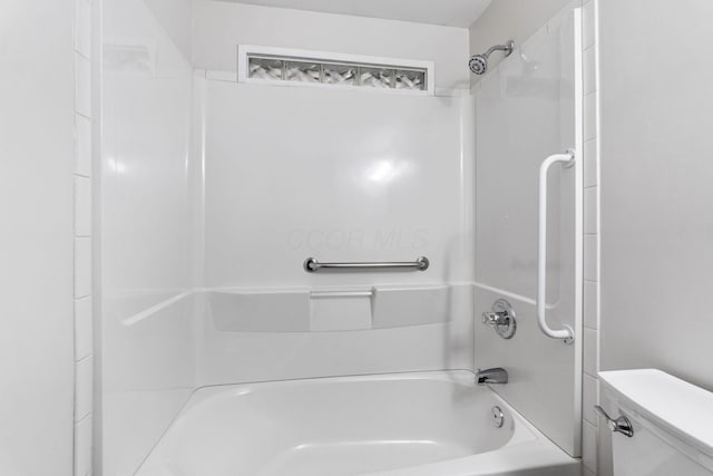 bathroom with toilet and shower / washtub combination