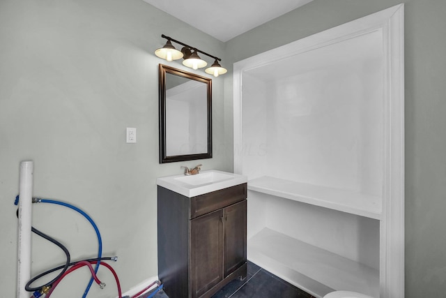 bathroom with tile patterned flooring and vanity