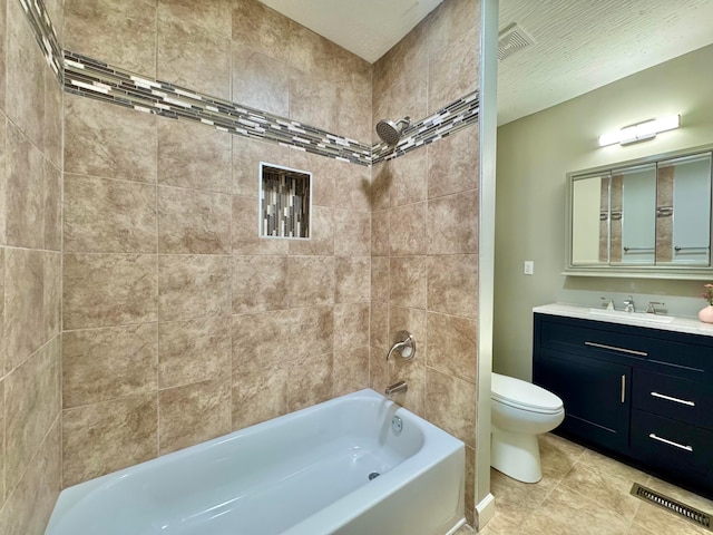 bathroom with  shower combination, visible vents, vanity, and toilet