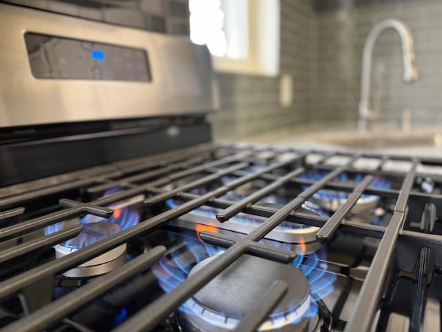 details featuring stainless steel range with gas cooktop