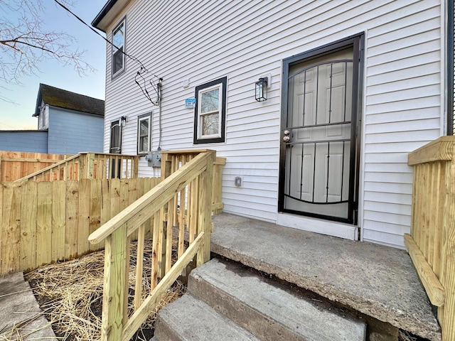 property entrance featuring fence