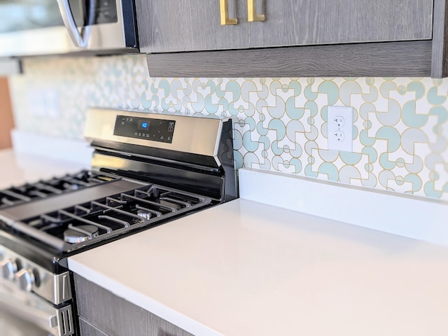 kitchen with stainless steel appliances and light countertops