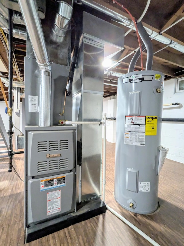 utility room with water heater