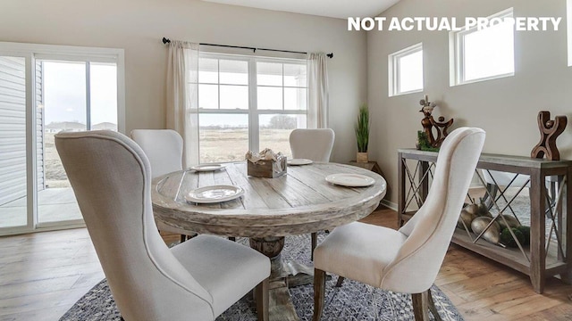 dining room featuring light wood-style flooring