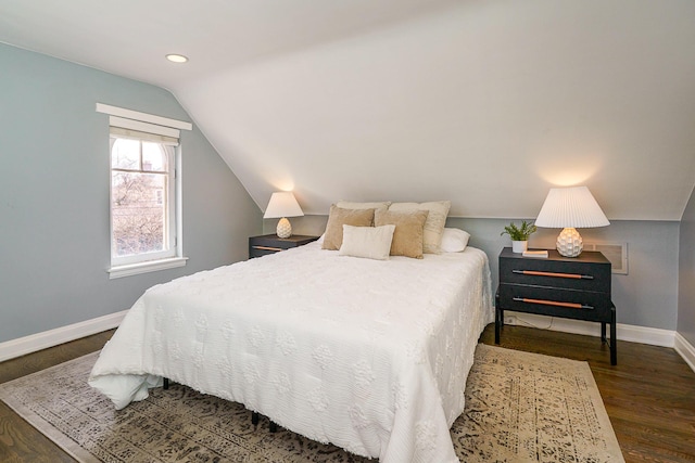 bedroom with lofted ceiling, dark wood-style flooring, baseboards, and recessed lighting