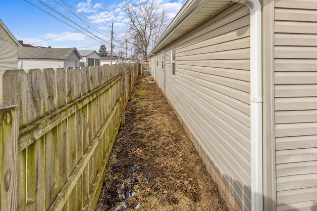 view of property exterior with fence