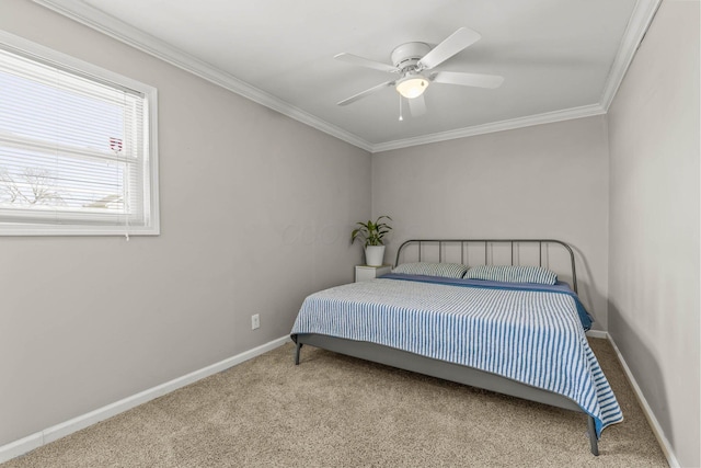 carpeted bedroom with ornamental molding, baseboards, and a ceiling fan