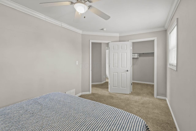 bedroom with light carpet, visible vents, baseboards, ornamental molding, and a closet