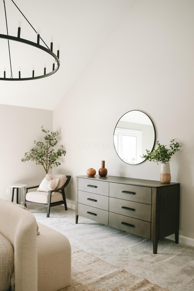 sitting room featuring carpet floors, high vaulted ceiling, and baseboards