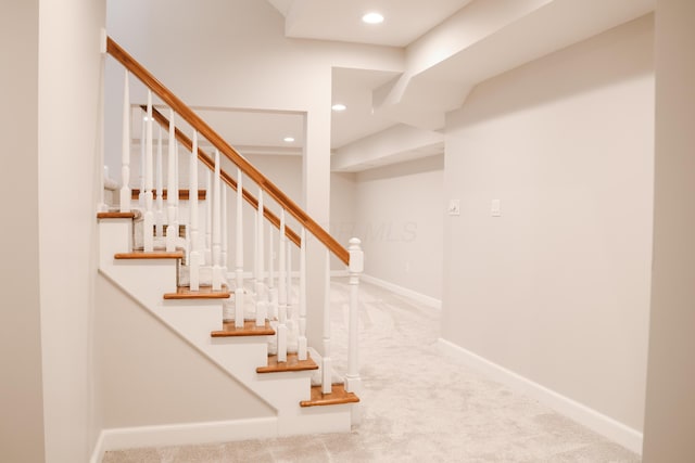 staircase with baseboards, carpet flooring, and recessed lighting