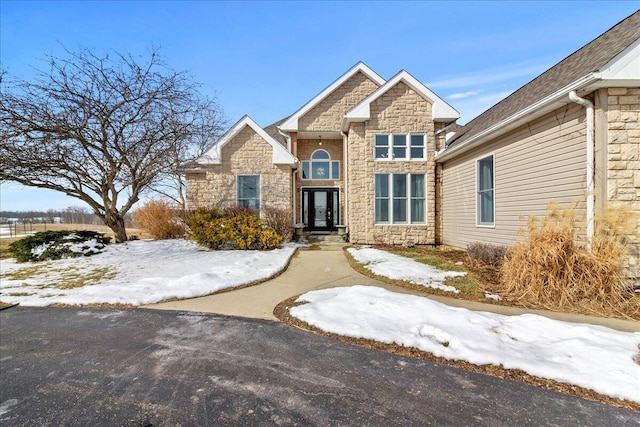 craftsman house with stone siding