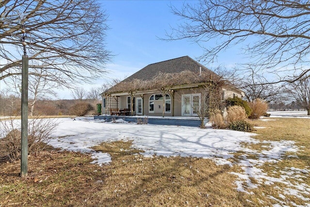 view of snow covered property