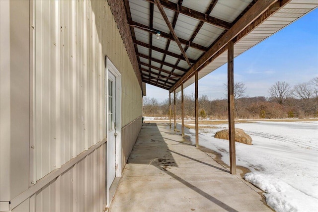 view of snow covered patio