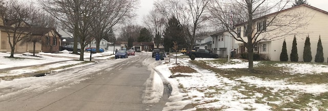 view of street featuring sidewalks and a residential view