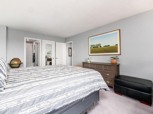 bedroom with light colored carpet