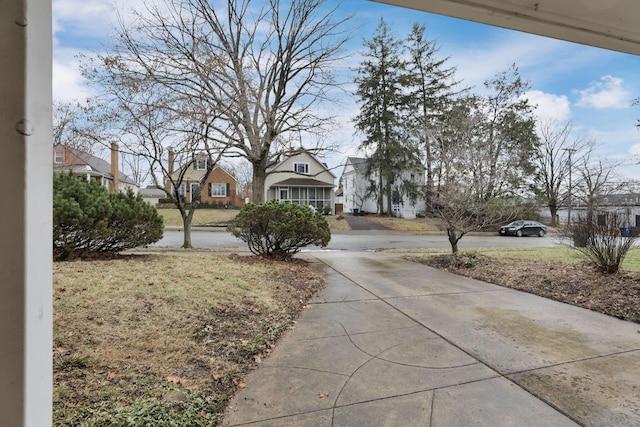 view of yard featuring a residential view