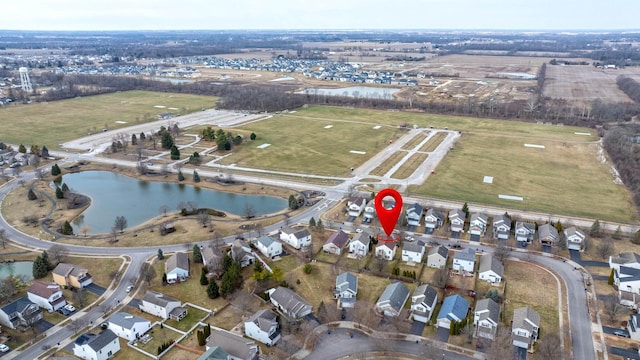 aerial view featuring a residential view and a water view