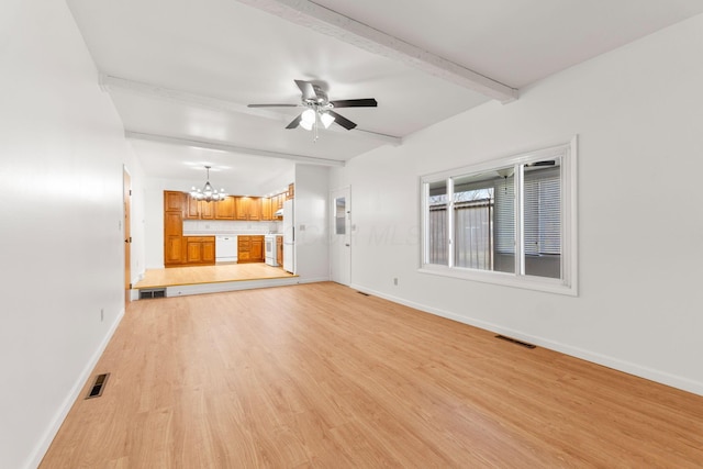 unfurnished living room with light wood-type flooring, visible vents, and beamed ceiling