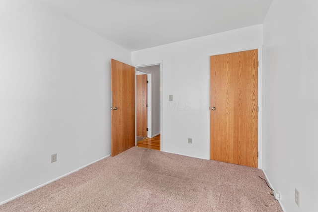 spare room featuring carpet flooring