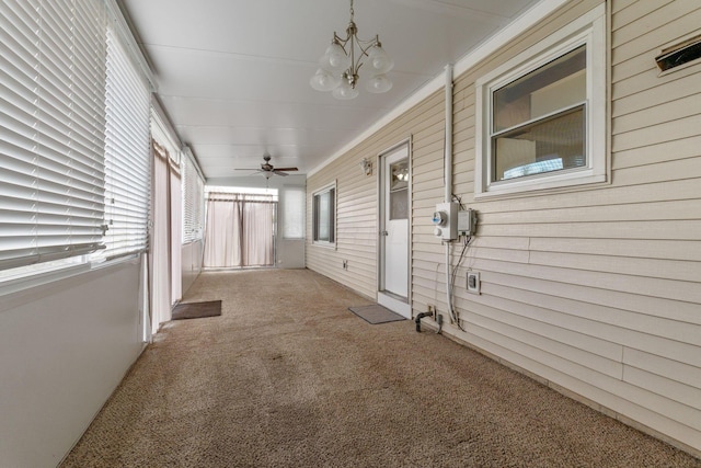 exterior space with a chandelier