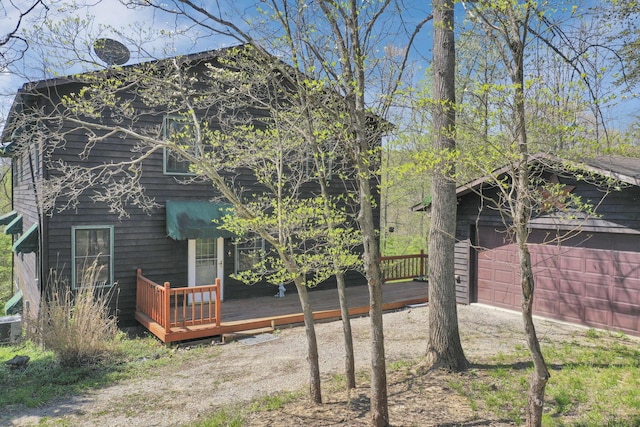 2098 Maya Ln, Sugar Grove, OH 43155 - view of home's exterior with a wooden deck and central AC unit