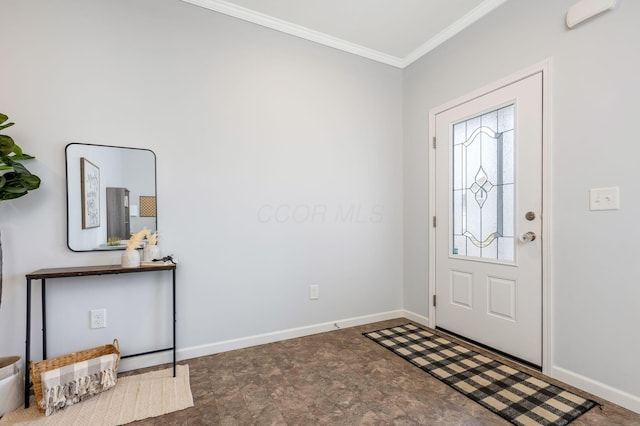 entrance foyer featuring baseboards and crown molding