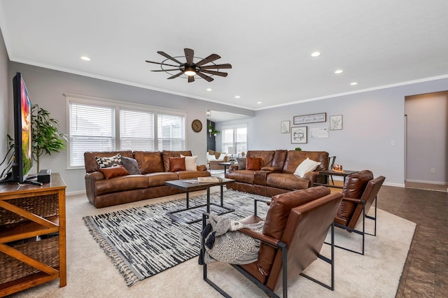 living area featuring baseboards, recessed lighting, and crown molding