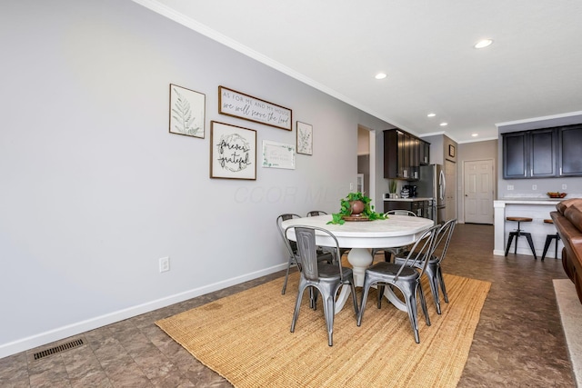 dining space featuring ornamental molding, recessed lighting, visible vents, and baseboards